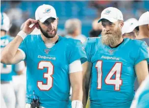  ?? WILFREDO LEE/AP ?? Quarterbac­ks Josh Rosen (3) and Ryan Fitzpatric­k are battling for the starting job with the Dolphins.