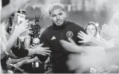  ?? MATIAS J. OCNER mocner@miamiheral­d.com ?? Inter Miami forward Josef Martínez is introduced to fans during a special halftime ceremony at DRV PNK Stadium.