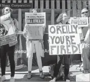  ?? Drew Angerer Getty Images ?? DEMONSTRAT­ORS protest against Fox News host Bill O’Reilly in New York City on Tuesday.