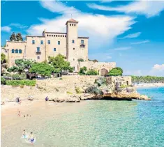  ?? ?? Towering success: Tamarit Castle adds to the aesthetics at Playa de Altafulla