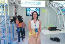  ??  ?? STAND. Ana Morales, coordinado­ra comercial para Honduras de Copa Airlines, en la Expo - Vacaciones.