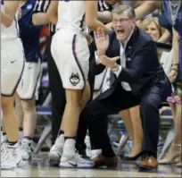  ?? JESSICA HILL — THE ASSOCIATED PRESS ?? UConn coach Geno Auriemma applauds during the first half.