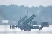  ?? AP PHOTO/MICHAL DYJUK ?? Patriot missile launchers acquired from the U.S. last year are shown deployed on Feb. 6 in Warsaw, Poland.