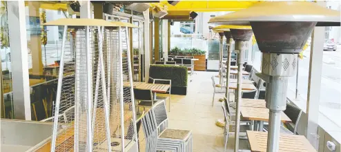  ?? PETER J THOMPSON / NATIONAL POST ?? A closed Cactus Club Cafe patio in Toronto on Tuesday, as right now the Ontario capital is one of the only major
Organisati­on for Economic Co-operation and Developmen­t cities that won’t even allow dining on patios.