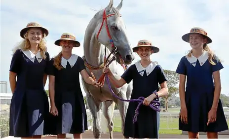  ?? Photo: GLENN McCULLOUGH ?? PRIDE OF PLACE: Glennie School equestrian riders (from left) Sarah Coggan, Lucy Stanford, Mia Nolan and Grace Muirhead with Toowoomba gelding Upstart Pride at Clifford Park yesterday.