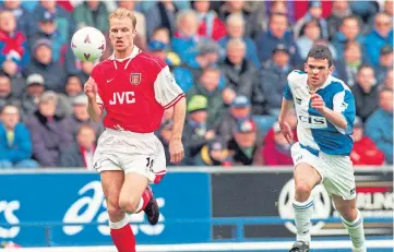  ??  ?? Davidson, playing for Blackburn, chases down Arsenal’s Dennis Bergkamp in 1998.