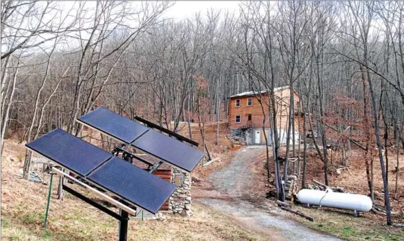  ?? AFP ?? Solar panels are seen at allegedly self-reliant Fortitude Ranch in Mathias, West Virginia.
