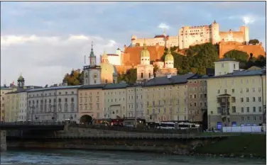  ?? (Rick Steves) ?? Salzburg’s Hohensalzb­urg Fortress looms 400 feet above Austria’s famous Baroque city.