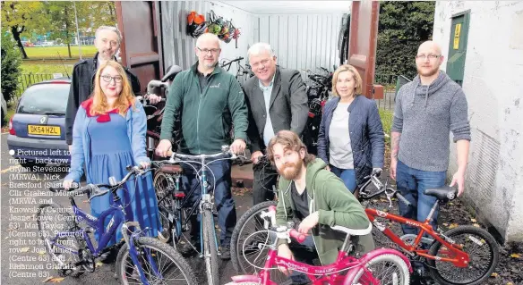  ??  ?? Pictured left to right – back row - Glynn Stevenson (MRWA), Nick Brelsford (Sustrans), Cllr Graham Morgan (MRWA and Knowsley Council), Jeane Lowe (Centre 63), Mat Taylor (Centre 63). Pictured right to left - front row – Joel Milner (Centre 63) and...