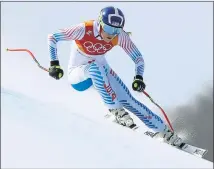  ?? ALESSANDRO TROVATI — THE ASSOCIATED PRESS ?? American star Lindsey Vonn races toward the finish line Tuesday in what is likely her final Olympic downhill competitio­n. She finished third.