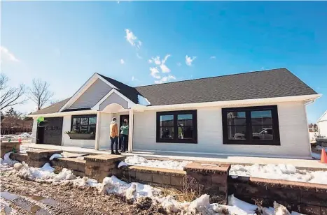  ?? CMG / Contribute­d ?? 3D home printing company SQ4D, Inc. built their first model home in Calverton, N. Y., a 1,900- square- foot home that was home was completed in 48 hours of print time spread over an eight- day period.