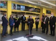  ?? RACHEL RAVINA — MEDIANEWS GROUP ?? State Sen. Maria Collett, D-12th Dist., is surrounded by Pennsylvan­ia lawmakers during a Thursday afternoon press conference at &Pizza in Willow Grove as she urges the need for a higher state minimum wage.