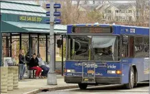  ?? FILE PHOTO ?? Riders wait for the bus at the CDTA Uncle Sam Bus Stop in Troy.