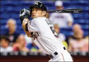  ?? ROB FOLDY / GETTY IMAGES ?? Ichiro Suzuki is one of the 31 players in the 3,000-hit club. Ichiro has 3,080 hits in the majors and another 1,278 in nine seasons in Japan.