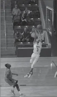  ?? The Sentinel-Record/File photo ?? GOOD HANDS: Jessievill­e senior guard Alex Burleson (3) throws down a slam dunk on Jan. 9 during a 74-65 home win against Malvern. Burleson was among local student-athletes named All-State by the AAA this week.