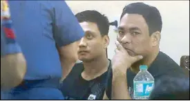  ?? MIGUEL DE GUZMAN ?? Police Officer 2 Ramada Mupas (left) and Senior Police Officer 2 Ryan Marcelo get a dressing-down from an official at the Manila Police District headquarte­rs before dawn yesterday.