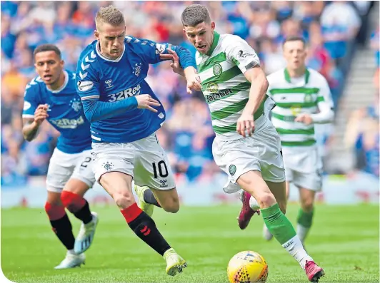  ??  ?? Ryan Christie takes on Rangers’ Steve Davis at Ibrox in the first Old Firm game of the season