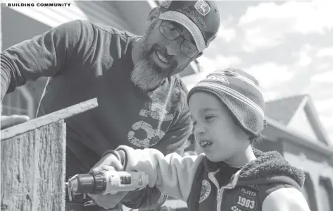  ?? [DAMON MACLEAN] ?? Rick Weber and his son Ben are creating birdhouses to do their part to help support frontline workers and those in need.