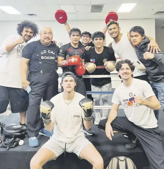  ?? PHOTOGRAPH COURTESY OF EUMIR MARCIAL ?? MARLON Tapales (third from left) and Jade Bornea (fourth from left), Eumir Marcial (fifth from left) have all turned on the heat in their Las Vegas training camp with the help of the combined Filipino and American training team.