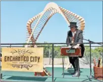  ??  ?? A musical performer at the festival Saturday.