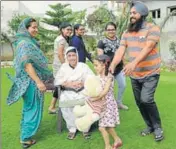  ??  ?? Businessma­n Amritpal Singh Sodhi and his wife Gurwinder Kaur (left) with their four daughters in Fatehgarh Sahib. BHARAT BHUSHAN/HT