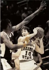  ?? SUBMITTED ?? Jay Hansen, right, looks for an opening in a game during his playing days with Arkansas State University.