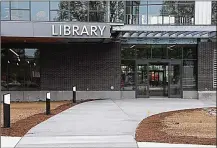  ?? MARSHALL GORBY / STAFF ?? Dayton Metro Library recently held a preview celebratio­n and sneak peek for its new downtown main branch at the corner of Patterson and Third streets in Dayton. A free community open house is slated for noon to 5 p.m. on Saturday, Aug. 5.