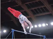  ?? Danielle Parhizkara­n-usa today sports ?? Brody Malone competes in the men’s horizontal bar during the Tokyo 2020 Olympic Summer Games at Ariake Gymnastics Centre on Aug. 3 in Tokyo, Japan.