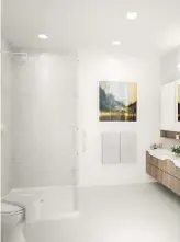  ??  ?? Bathrooms will feature glass shower stalls, porcelain tiles and Kohler hand-shower hardware.