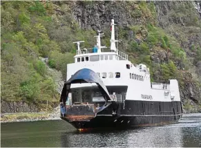  ??  ?? The ferry plying between Gudvangen and Flam preparing to berth at Gudvangen.