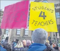  ?? CP PHOTO ?? Students and parents protest outside the legislatur­e in Halifax on Dec. 5, 2016. Nova Scotia teachers testified Thursday that classroom problems ranging from student violence to the neglect of students with learning disabiliti­es will worsen if the...