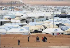  ??  ?? A refugee camp similar to the one Hisham Alsaiyad and his family lived in for five years
