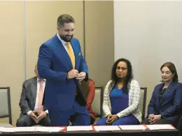  ?? FERNANDO LLANO/AP ?? Nicolas Maduro Guerra, the son of Venezuelan President Nicolas Maduro, gets ready to sign an agreement to create a U.N.-managed fund on Saturday in Mexico City.