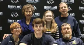  ?? Scott Herpst ?? Ridgeland senior tight end Kendall Barrett signed papers to continue his football career at Reinhardt University last week. Also on hand for the signing ceremony was Amy Barrett, Brad Barrett, Sandra Shields, Kaylee Barrett and Ron Shields.