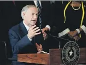  ?? Tony Gutierrez Associated Press ?? GOV. GREG ABBOTT, a Republican, has called for making it easier for private dealers to do background checks, and harder for owners to give their guns away.