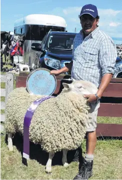  ??  ?? Left: Jeff Thompson, of Five Forks, won the Wool Cup at last year’s show with this Border Leicester ram.