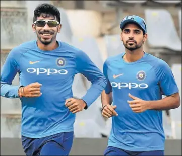  ??  ?? Bhuvneshwa­r Kumar (right) and Jasprit Bumrah have been India captain Virat Kohli’s goto bowlers, especially in the death overs.