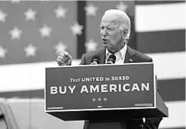  ?? PATRICK SEMANSKY/AP ?? Democratic presidenti­al candidate Joe Biden speaks Wednesday during an event in Michigan. The former vice president has largely adhered to social distancing while campaignin­g.