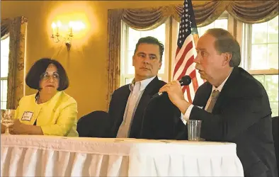  ?? Chris Bosak / Hearst Connecticu­t Media ?? State Sen. Michael McLachlan talks while fellow legislator­s state Sen. Toni Boucher and state Rep. Will Duff look on during the Bethel Chamber of Commerce’s annual meeting on Monday at Michaels at the Grove in Bethel.