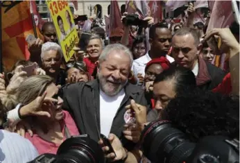  ?? ANDRE PENNER/THE ASSOCIATED PRESS FILE PHOTO ?? Brazil’s former President Luiz Inacio Lula da Silva is beloved by many despite the corruption charges he faces.