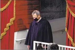  ?? Kent Nishimura Los Angeles Times ?? CHIEF JUSTICE of the United States John G. Roberts Jr. arrives for Joe Biden’s presidenti­al inaugurati­on at the U.S. Capitol on Jan. 20, 2021.