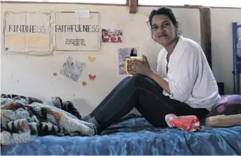  ?? ?? Simone Smith on one of the bunk beds in a Wendy house where women sleep at Eleanore’s Recovery Centre.