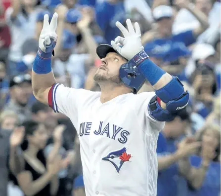  ?? FRED THORNHILL/THE CANADIAN PRESS ?? Toronto Blue Jays’ Josh Donaldson celebrates his two-run home run against the New York Yankees in the first inning of their AL baseball game, in Toronto, on Tuesday.