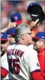  ?? DERIK HAMILTON — THE ASSOCIATED PRESS ?? Philadelph­ia Phillies manager Pete Mackanin tips his cap to the crowd prior to a baseball game against the New York Mets, Sunday.