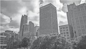  ?? DAVE MORRIS ?? A drone image of the former Sandridge Tower, which served as the company’s headquarte­rs before moving to another location in Bricktown.