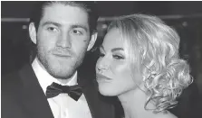  ?? TONY CALDWELL / POSTMEDIA NEWS ?? NHLER Mike Hoffman, with fiancée Monika Caryk, denies cyberbully­ing. “There is a 150 per cent chance (we) are not involved.”