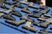  ?? DAKOTA SANTIAGO — THE NEW YORK TIMES ?? So-called “ghost guns” are displayed during an NYPD news conference in New York, in May of 2022.