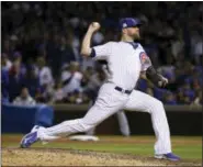  ?? NAM Y. HUH — THE ASSOCIATED PRESS FILE ?? In this Wednesday file photo, Chicago Cubs relief pitcher Wade Davis throws during the ninth inning of Game 4 of baseball’s National League Championsh­ip Series against the Los Angeles Dodgers, in Chicago.