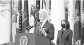  ?? ALEX BRANDON/AP ?? With Vice President Kamala Harris looking on, President Joe Biden speaks about the American Rescue Plan, the $1.9 trillion coronaviru­s relief package he signed into law this week, during an event Friday at the Rose Garden.