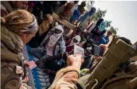  ?? GETTY IMAGES ?? French soldiers from Operation Barkhane in the Sahel, Africa, question villagers during a patrol in Mali.